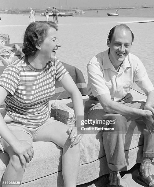 Enjoying a laugh at the Lido in Venice are Colin Tennant, who was recently linked romantically with with Britain's Princess Margaret, and Judith...