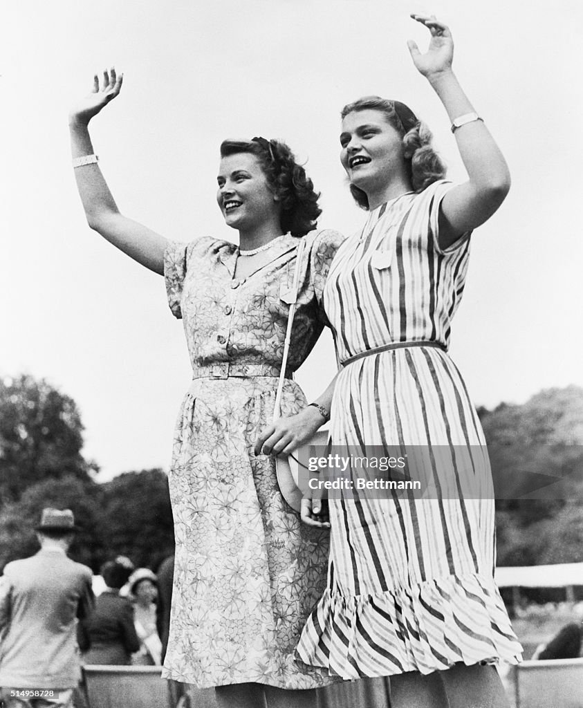 Sisters Waving to Their Brother