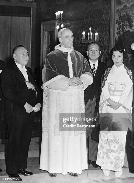 Japanese Premier Shigeru Yoshida called on Pope Pius XII in a solemn audience. The two conferred alone for 15 minutes in the Pope's private library...