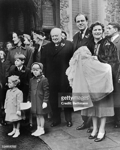 Prime Minister Sir Winston Churchill smiles after attending the christening of his youngest granddaughter, Charlotte Clementine Soames, , at...