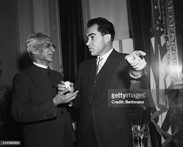 India's Vice President Sarvepalli Radhakrishman presents Vice President Richard Nixon with an ivory gavel during a visit to the Capitol, November...