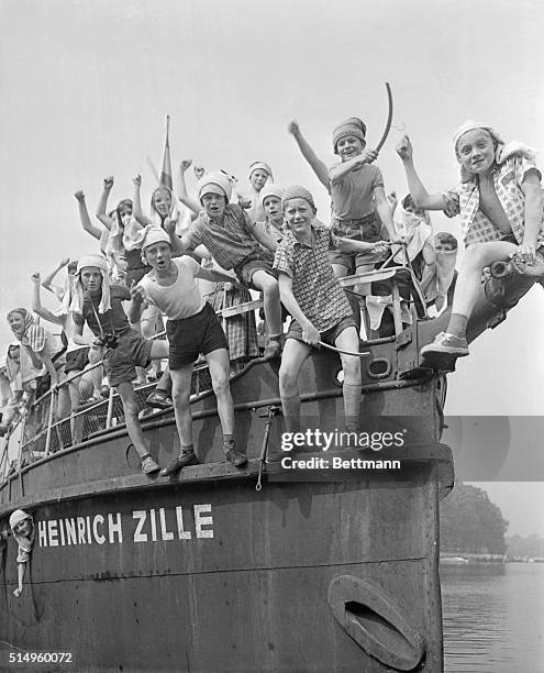 Barging Off For The Summer. Fierce pirates shout their war cries as they swarm over the bow of the good ship Heinrich Zille. These West Berlin...