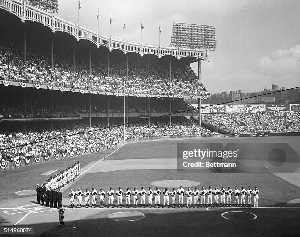 Pray for President's Recovery. New York, New York: Players and fans bow their heads in silent prayer at Yankee Stadium for the speedy recovery of...