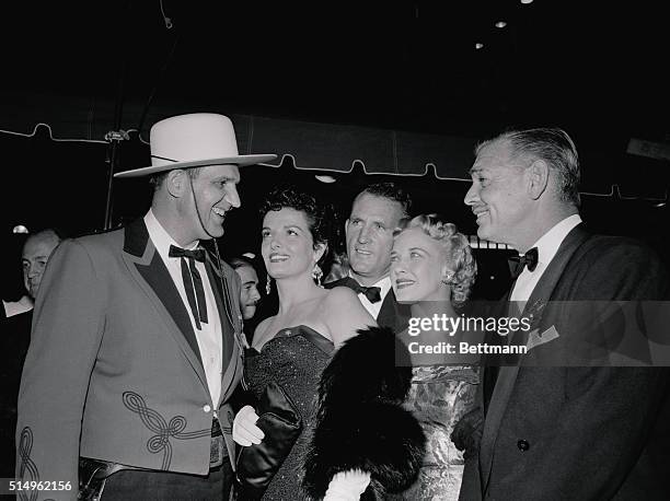 Gable and Russell New Sheriffs. Hollywood, California: It was badge night at the Hollywood Grauman Chinese Theater during the world premiere of The...