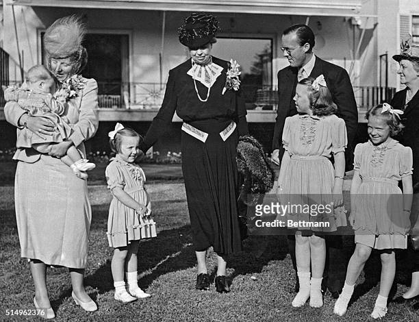 Soestdyk, Holland: Mrs. F. D. R. Visits Royalty. Princess Juliana holding Princess Maria Christina, Princess Margriet, Mrs. Eleanor Roosevelt, Prince...