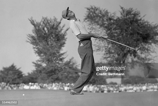 It's a painful moment for ex-painless dentist Cary Middlecoff, as he narrowly misses a long putt on the 34th hole in his match with Jack Burke July...