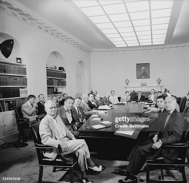 Vice President Richard Nixon presides over a meeting of the Cabinet at the White House conference in Geneva. Clockwise around table: Sherman Adams,...