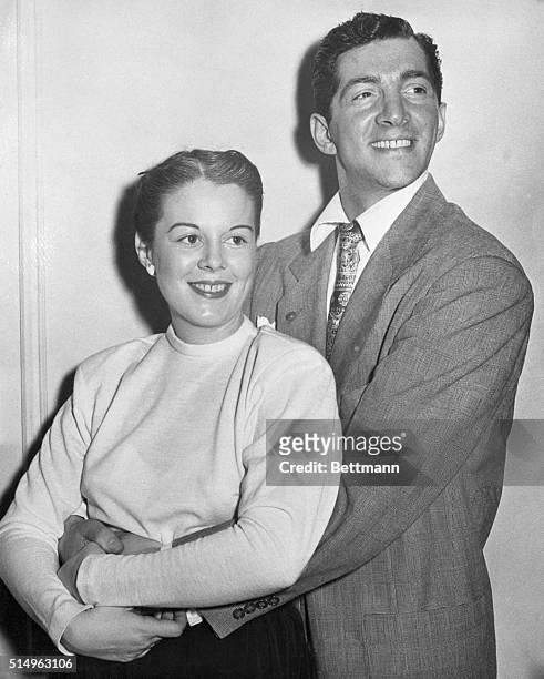 Songstar Dean Martin pictured with his wife, Betty, is all smiles over the fact that the stork just visited them and left a six pound baby girl named...