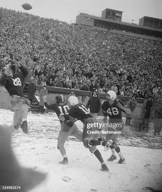 Ted Kennedy , Harvard end, grimaces in despair as the Ball sails past, too high, in the Yale end zone, on a pass from behind a scrimmage line at the...