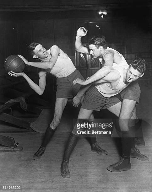 University of Chicago Basketball Players Demonstrating Moves