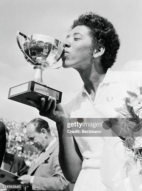 French Open Winner Althea Gibson Kissing Trophy on May 26, 1956.