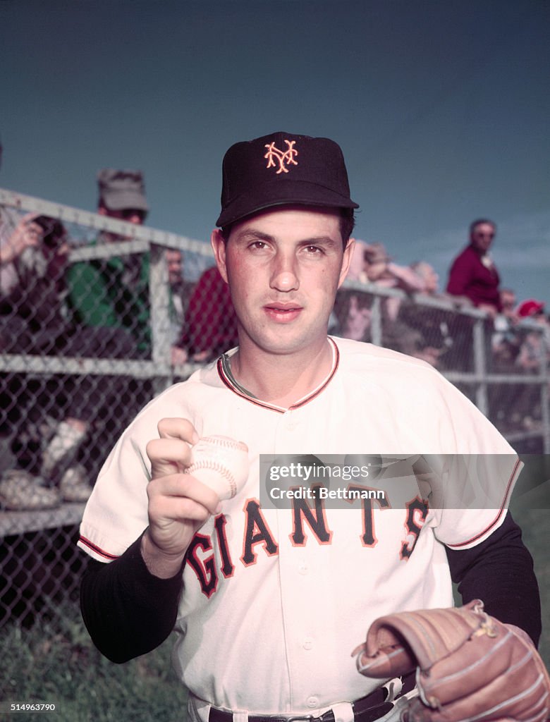 Pitcher Hoyt Wilhelm Holding Baseball