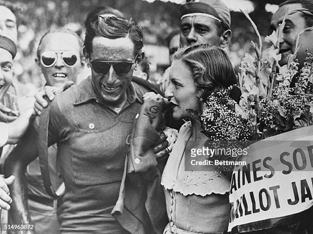 Editor's notes: Paris, July 21, 1949. At the end of 21th and last lap of the 1949 "Tour de France" which took riders from Nancy to Paris, the Italian...