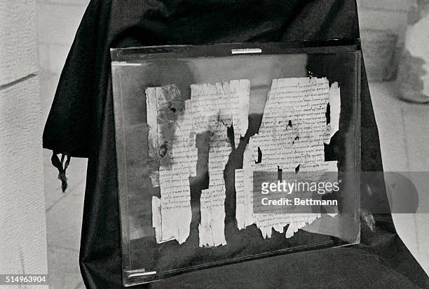 This is a close-up of pieces of the Dead Sea Scroll, called "The Manual of Discipline" which describes "A Covenant of Steadfast Love" in which...