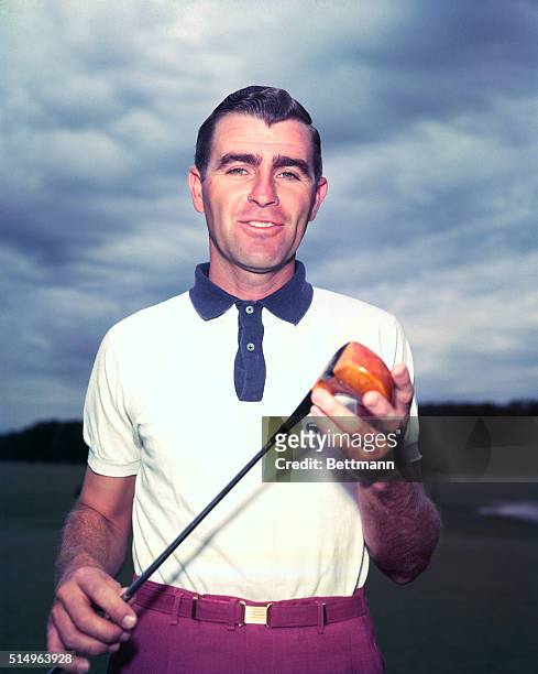 Open Champion Jack Fleck poses with a golf club.