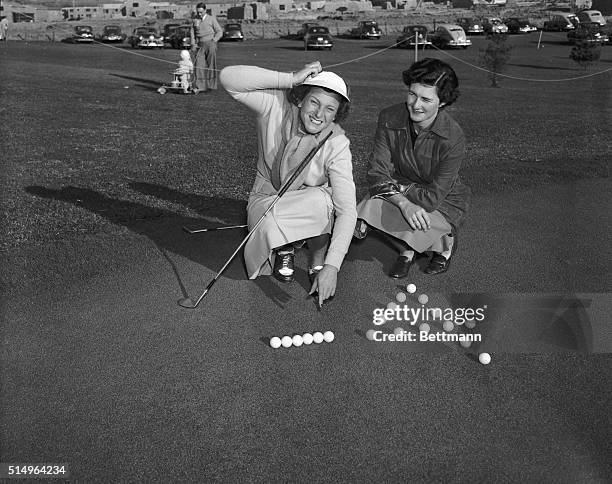 Babe Didrikson Zaharias , of Grossinger, New York, picked up two strokes in the Women's National Open Golf Championship today but still trailed...