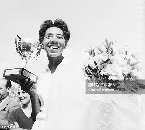 Miss Gibson wins French international tennis championships. Pairs: Nothing like a beautiful Cup to reward a player for the efforts furnished. That's...