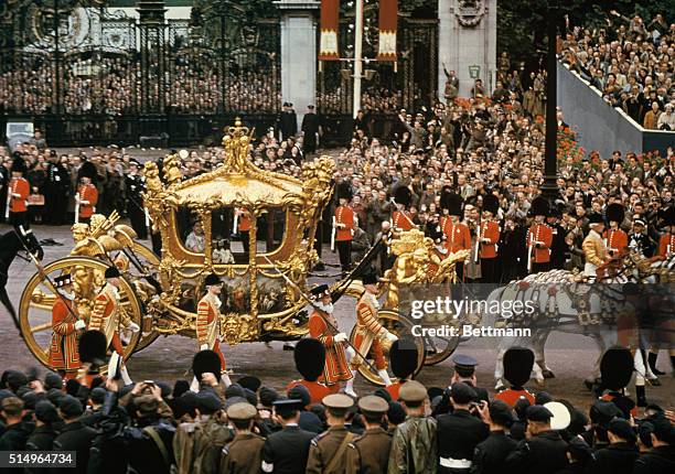 Queen Elizabeth II in the Gold State Coach after her coronation at Westminster Abbey, London, 2nd June 1953.