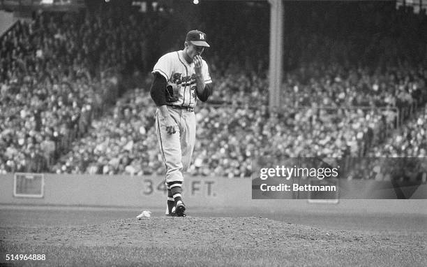 New York: Winning Touch. Milwaukee Braves' pitcher Lew Burdette is seen here during the October 10th title for 1957, by beating the Yanks in their...