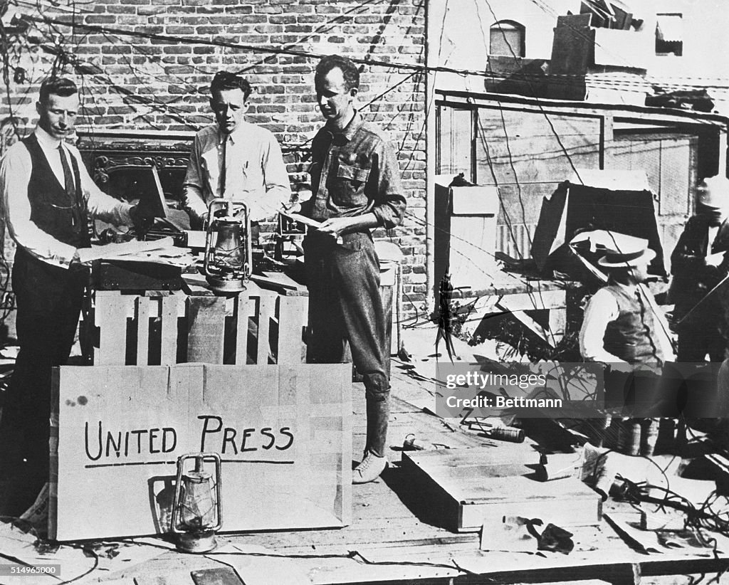 United Press President Frank H. Bartholomew and Assistants on Earthquake Scene