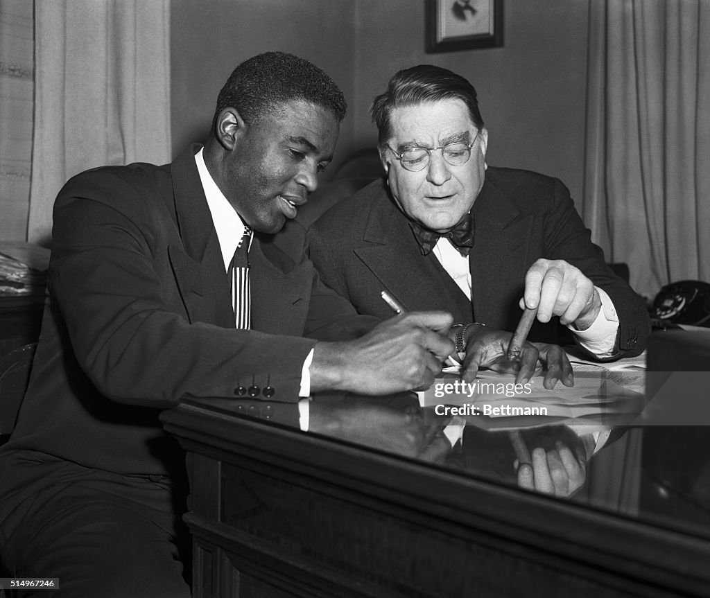 Jackie Robinson Signing Contract with Branch Rickey