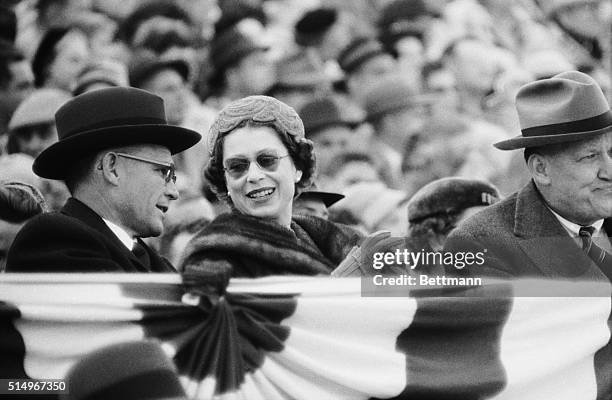 Queen Elizabeth is shown talking to Wilson H. Elkins, president of Maryland University, during the third quarter of the Maryland-North Carolina game...