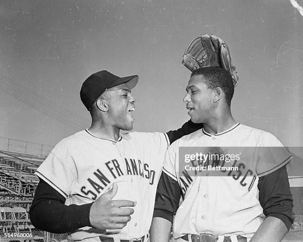 Pat on the head from outfielder Willie Mays, , greets San Francisco Giants first baseman Orlando Cepeda as the latter reported for his first workout...