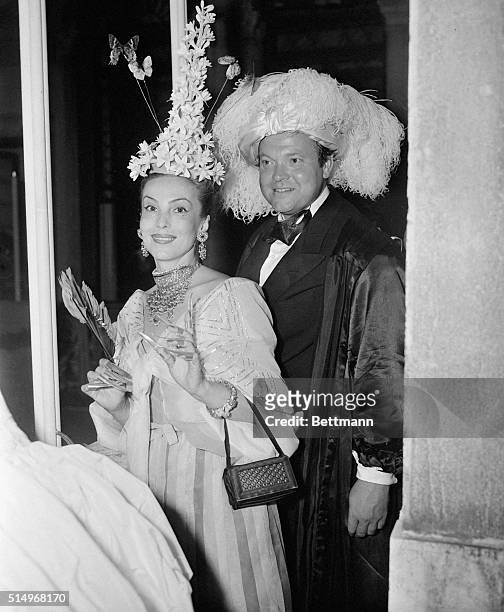 Orson Welles accompanied Brazilian actress Mademoiselle de Heeren... And his costume was one of the simplest while hers one of the most admired.