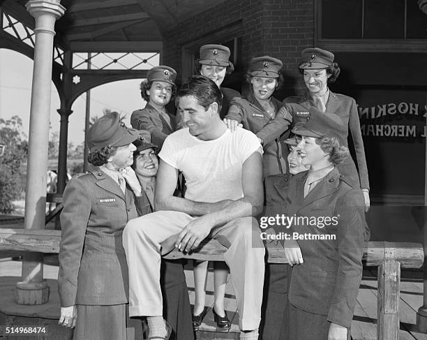 That's Steve Cochran, Warner Brothers star of Tomorrow is Another Day. Lady Leathernecks visited Cochran at the studio to tell him they had picked...