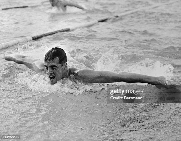 Meters breaststroke . John Davies of Australia, during heat two of the 200-metres breaststroke at the Olympic pool here. He won his heat in the time...