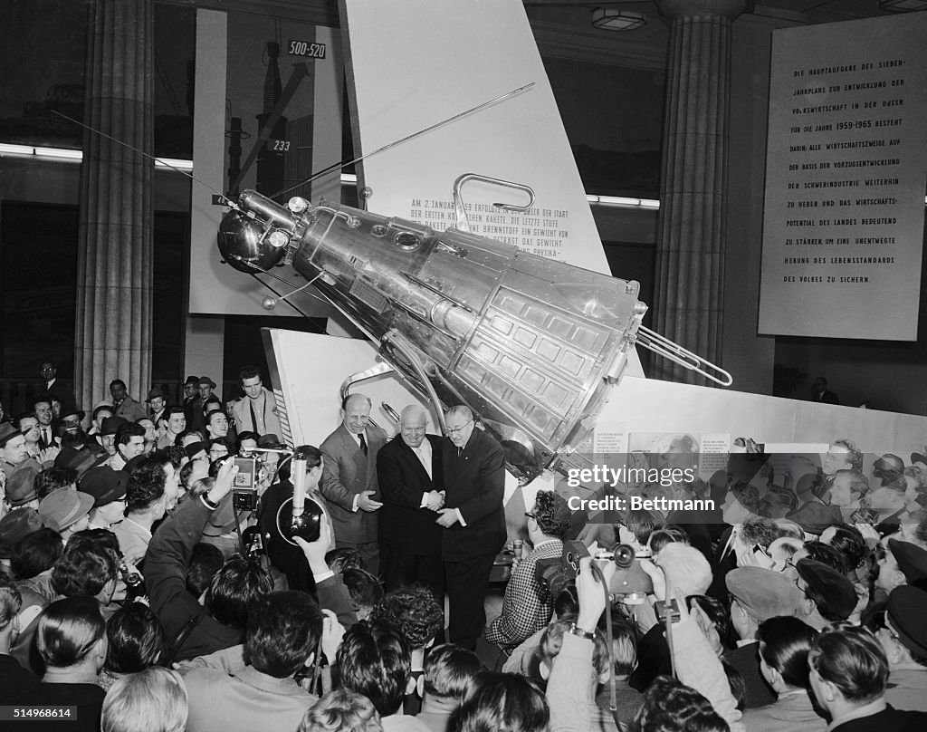 Nikita Khrushchev and German Leaders with Sputnik Replica