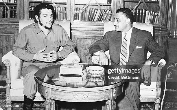 Nasser Meets with Cuban. Cairo, Egypt: United Arab Republic President Nasser meets with Cuban representative Ernesto Guevara at the presidential...