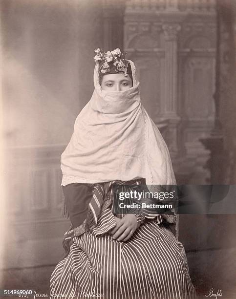 Portrait of young woman from the city of Nablus in traditional Middle Eastern dress.