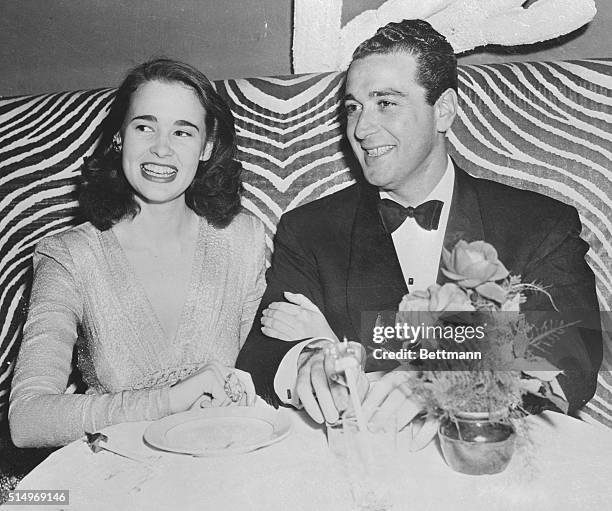 Gloria Laura Vanderbilt, who will inherit $34 000 fortune when she becomes 21, , is shown at a local nightclub with Pasquale DiCicco. After their...