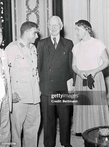 German finance expert Dr. Hjalmar Schact, and Mrs. Manci Schacht, meet with Egyptian Premiere General Naguib at the Presidency in Cairo. Dr. Schacht,...