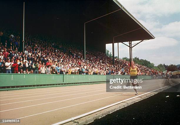 Steve Prefontaine, 1st in the 5000-meter. Shown in close-up views at the Olympic tryouts.