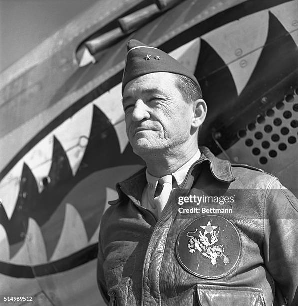Kunming, China- Major General Claire Chennault, Commander in the US Air Force during World War II, is shown posing at the Air Base in Kunming.