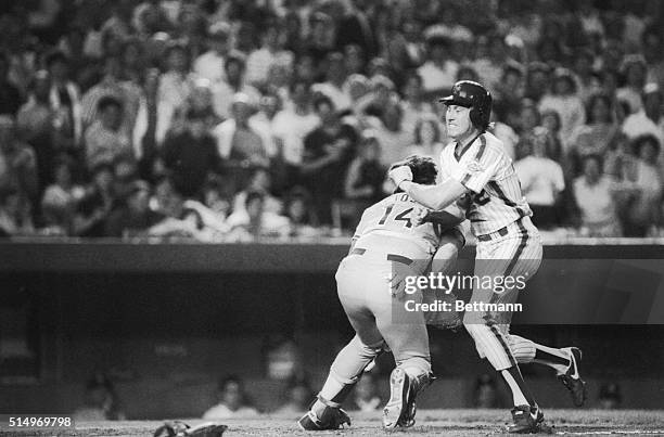 Mets' Ray Knight is safe at the plate beating the tag of Dodgers' catcher Mike Scioscia in the 4th inning at Shea Stadium. Knight scored from 2nd...