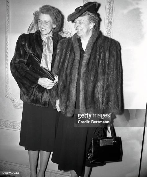 Mrs. Eleanor Roosevelt and Mrs. Anna Boettiger, wife and daughter of President Roosevelt are shown as they left the House of Representatives after...