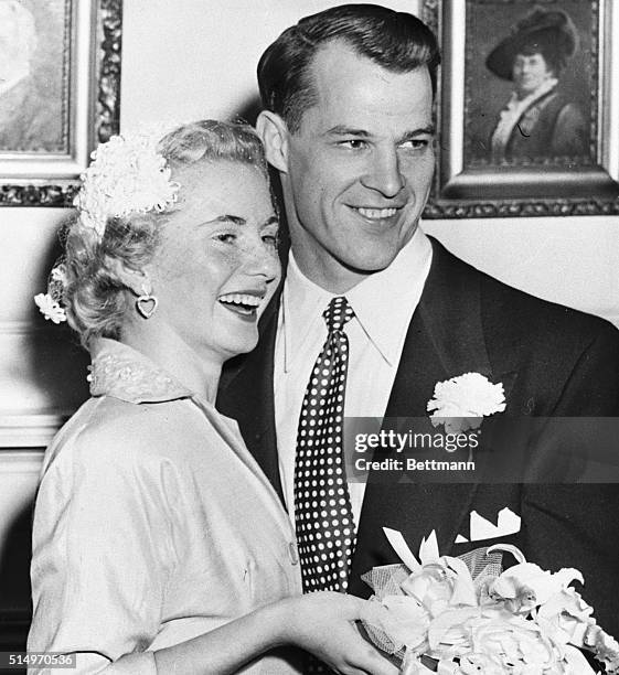 Detroit Red Wing star Gordie Howe and his bride, the former Colleen Joffa, are shown after their wedding.