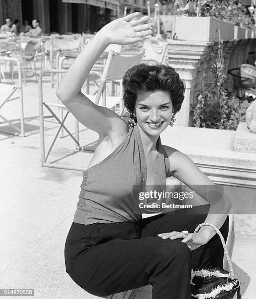 Bearing a striking resemblance, in more ways than one, to American film star Jane Russell, Spanish actress Aurora De Alba visits Venice's Lido, while...