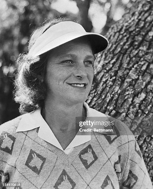 Mrs. Mildred "Babe" Didrikson Zaharias, U.S. Amateur golf champ, smiling, looks out over the St. Augustine, Florida course where she won the Florida...