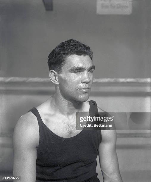 Getting set for his bout with Johnny Risko...Max Schmeling trains at Madame Bey's camp for his forthcoming bout with Johnny Risko.