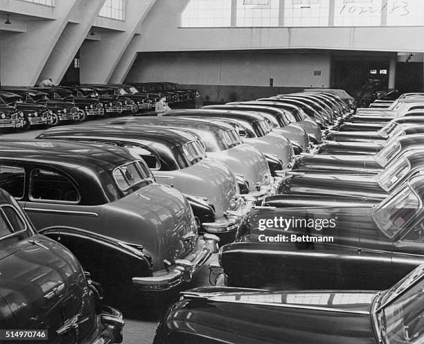 Fleet of cars in the royal garage, once used by ex-King Farouk and his family. They are mostly Cadillacs and Packards.