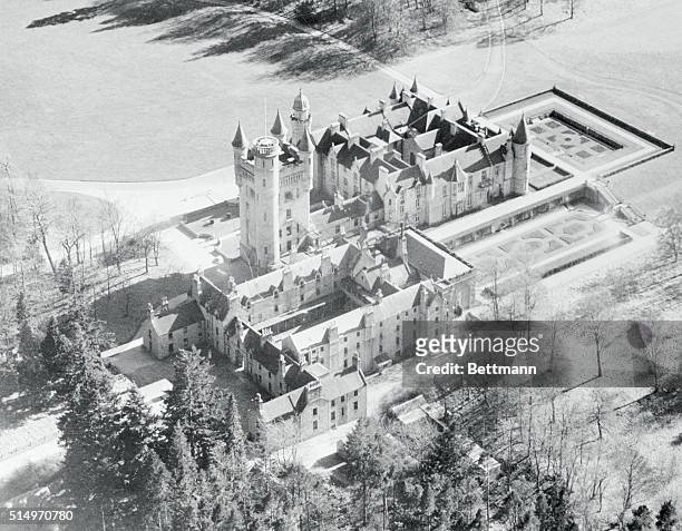 Aberdeenshire, Scotland: Castle From The Air. Turrets and spires reaching toward the sky lend a fairy tale atmosphere to historic Balmoral Castle,...