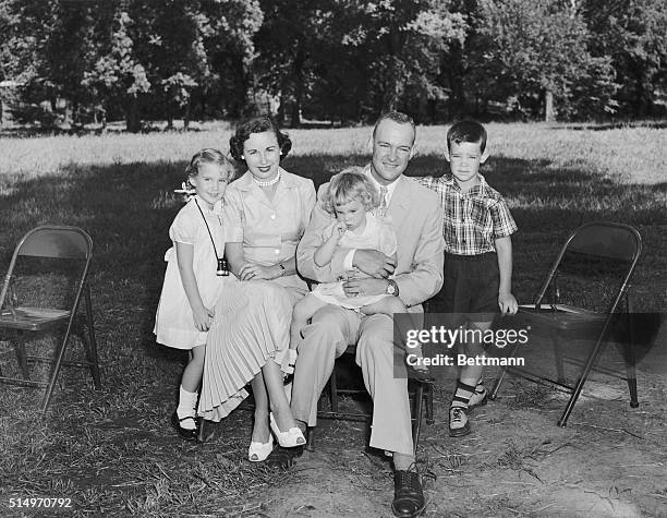 Barbara Ann Eisenhower uses her binoculars to get a better close-up of her parents, Major and Mrs. John Eisenhower, as her brother Dwight David II ,...