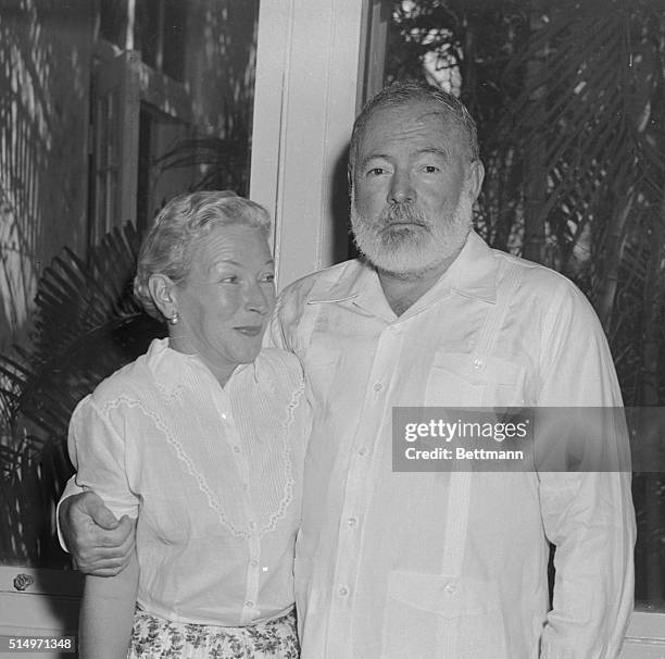 Author Ernest Hemingway embraces his wife Mary in their Havana home in this 1954 photo from files. Hemingway's widow has filed suit against A.E....