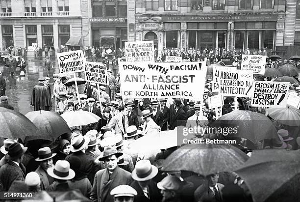 Communists hold May Day parade in New York...Police were stationed at the meeting place and along the route of march to quell any disturbances as...