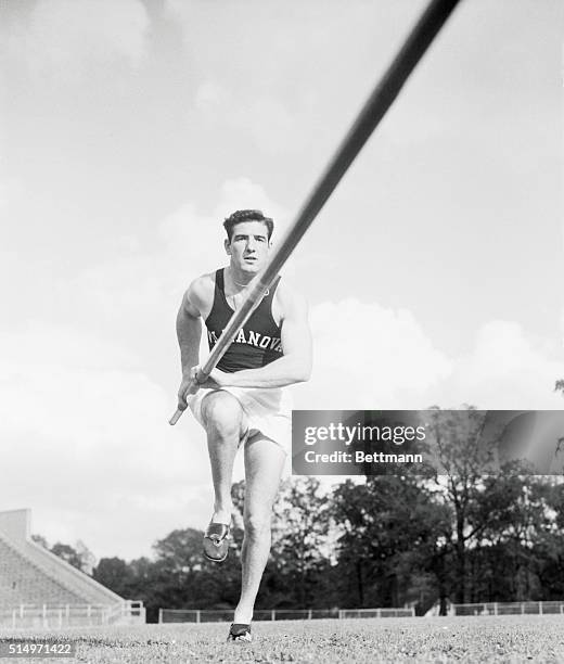 Training for this season, Villanova sophomore Don Bragg practices running with the pole to develop his stride. He hopes to vault 15 feet.