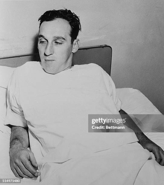 Milwaukee Braves' pitcher Warren Spahn rests after an operation to repair an injured cartilage in his right knee. Off season, the 21 game winning...